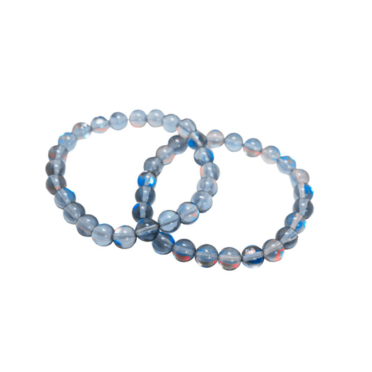 Black Aura Quartz Bracelet-Gemstone Jewelry This bracelet is made with black aura quartz and stretchy elastic. Although the name of the stone is black aura quartz, be reassured that the beads are beautiful blue in color. Packaging: This bracelet will come