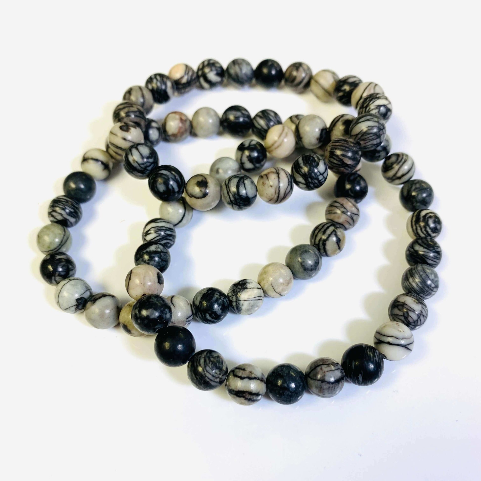Picasso Jasper Bracelet-Gemstone Jewelry This bracelet is made with picasso jasper, also known as spider web jasper, and stretchy elastic. You will receive a similar bracelet as picture shown, not exact one since each stone is unique to itself. Packaging: