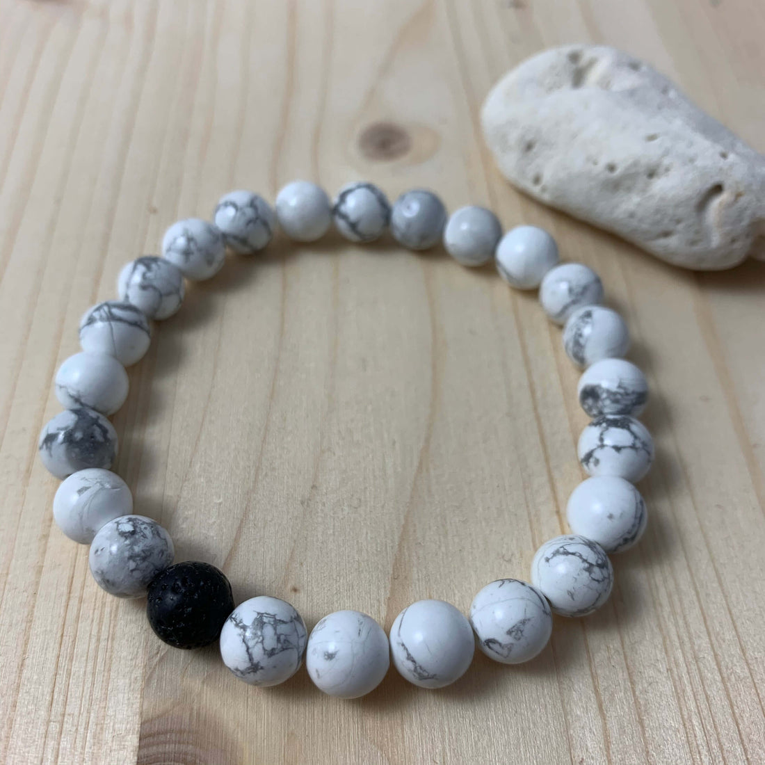 Howlite Howlite is known to possess calming &amp; balancing properties and more, making it the perfect stone to wear to help you feel calm, rested, and balanced. Discovered in Canada in 1868, Howlite gets its name from Henry How, the geologist credited wi