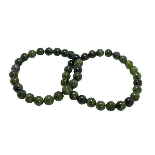 BC Jade Round Bracelet-Gemstone Jewelry This bracelet is made with 100% untreated genuine canadian nephrite jade, also known as BC Jade, and stretchy elastic. Packaging: This bracelet will come to you in an organza gift bag, along with an information shee