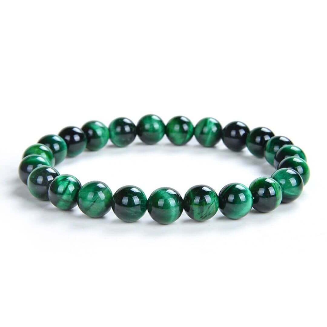 Malachite Bracelet-Gemstone Jewelry This bracelet is made with malachite beads and stretchy elastic. Grade AA. Stone mined from: Dominican Republic of Congo Packaging: This bracelet will come to you in an organza gift bag, along with an information sheet