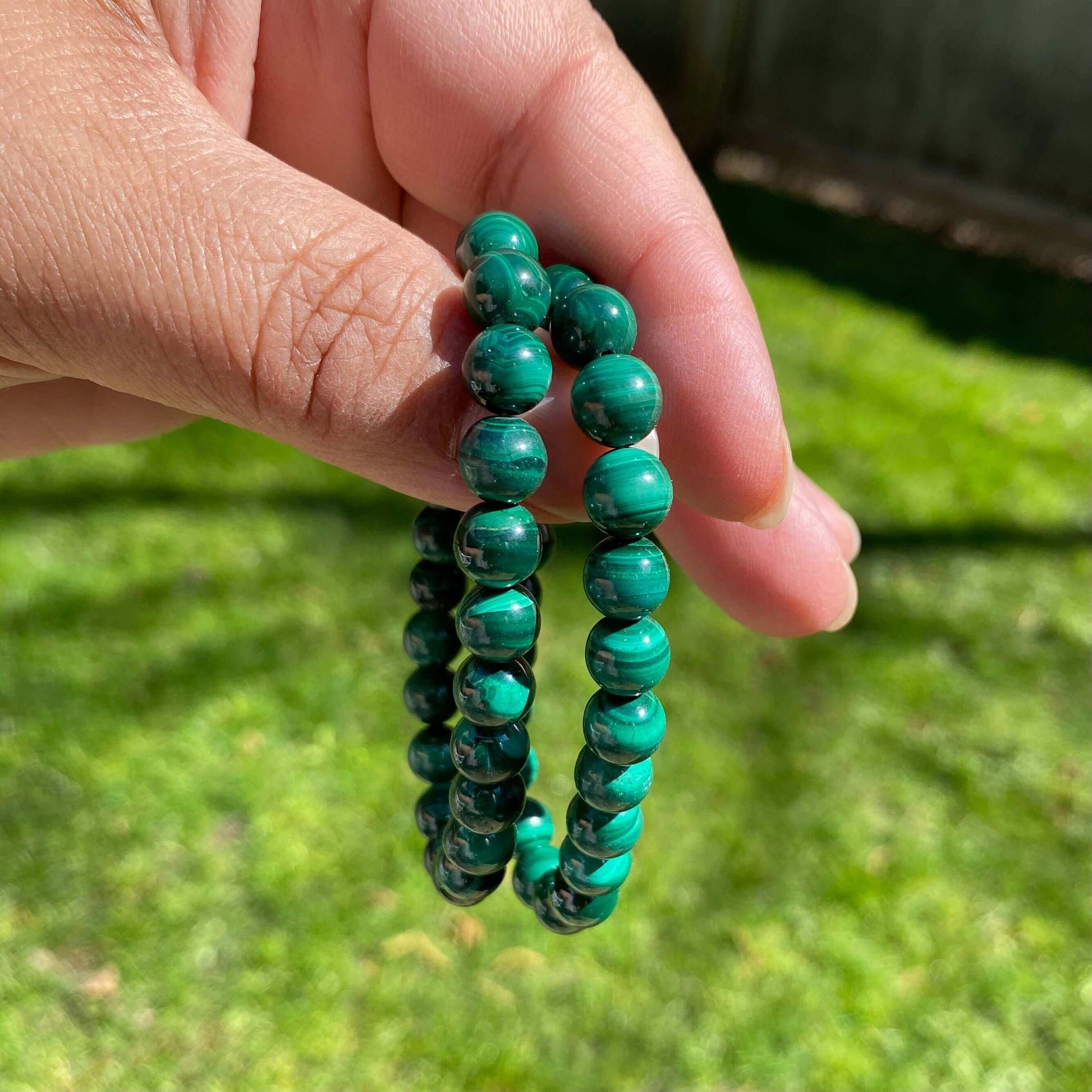 Malachite Bracelet-Gemstone Jewelry This bracelet is made with malachite beads and stretchy elastic. Grade AA. Stone mined from: Dominican Republic of Congo Packaging: This bracelet will come to you in an organza gift bag, along with an information sheet